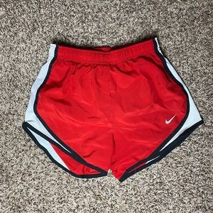 Red Nike shorts